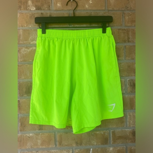 Gymshark Lightweight Neon Green Shorts 7” with zippered pockets, Size Medium - Picture 5 of 10